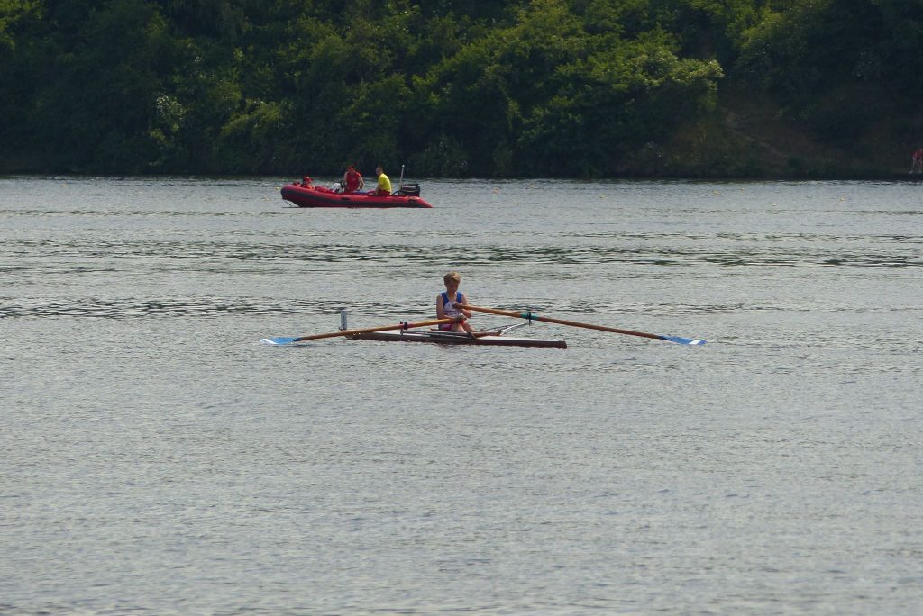 The Author's son rowing to his start